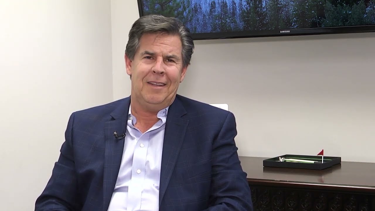 A man in a blazer speaking to camera in the John Geantasio CPA LLC video testimonial